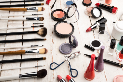 Makeup collection on white boards